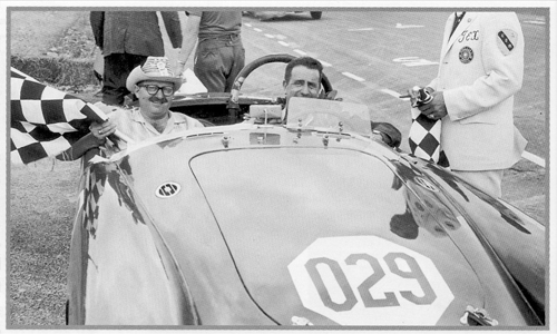 Bob Bucher with car owner Spanky smith in the victory circle