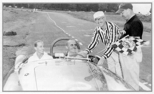 Joan & Sherm Decker in the winner's circle at the 1959 All MG Races of the W NY Ctr of the MG Car Club