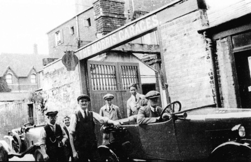 Alfred Lane Premises with Cecil Cousins Standing Beside the Car